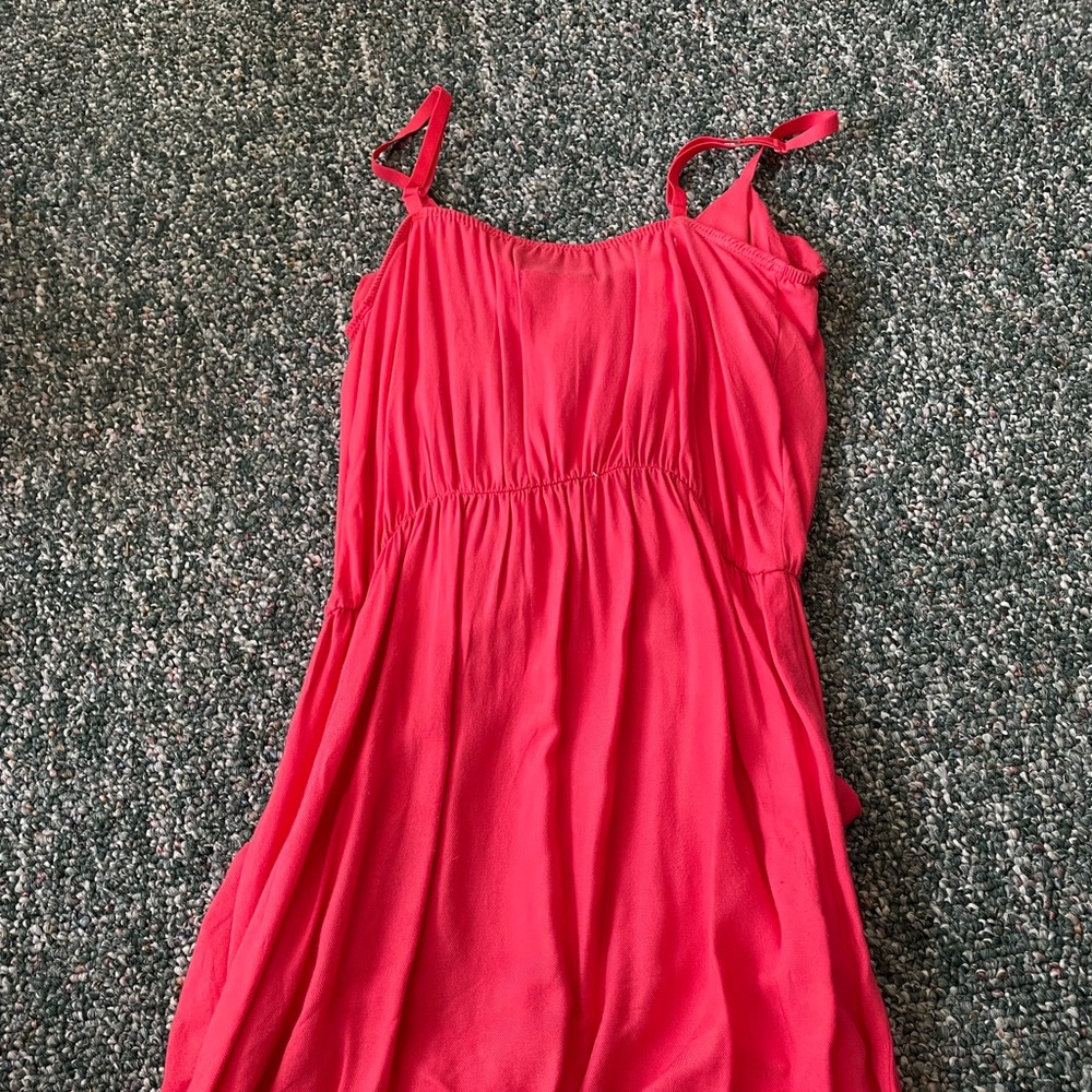 Pink spaghetti strap dress.
